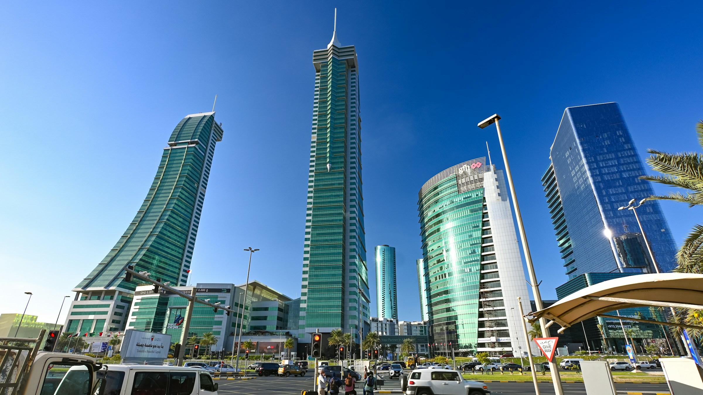 The towers of Bahrain Financial Harbour in Manama under a blue sky