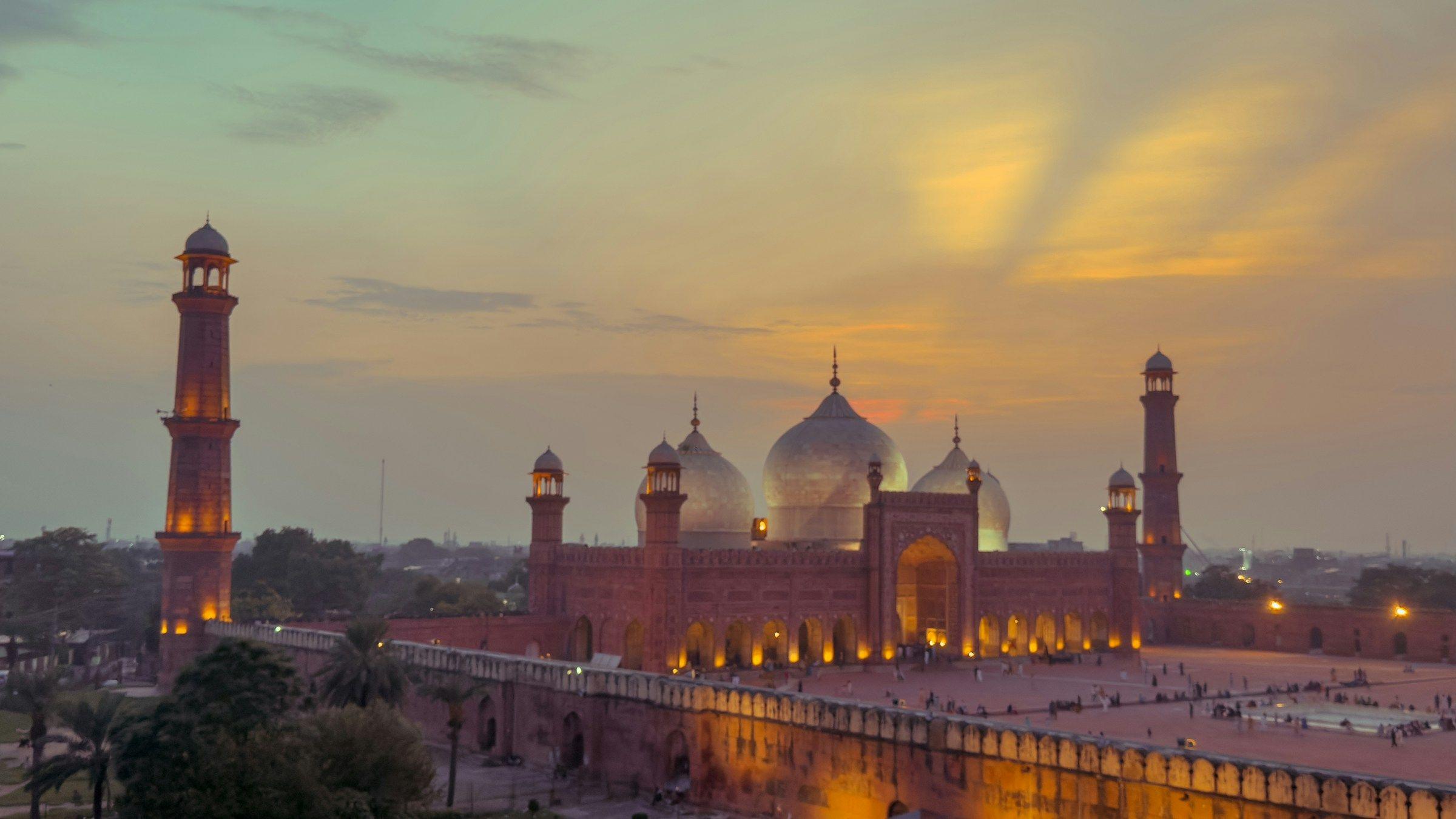 Badshahi Mosque in Lahore at sunset, seen from a rooftop in the Walled City