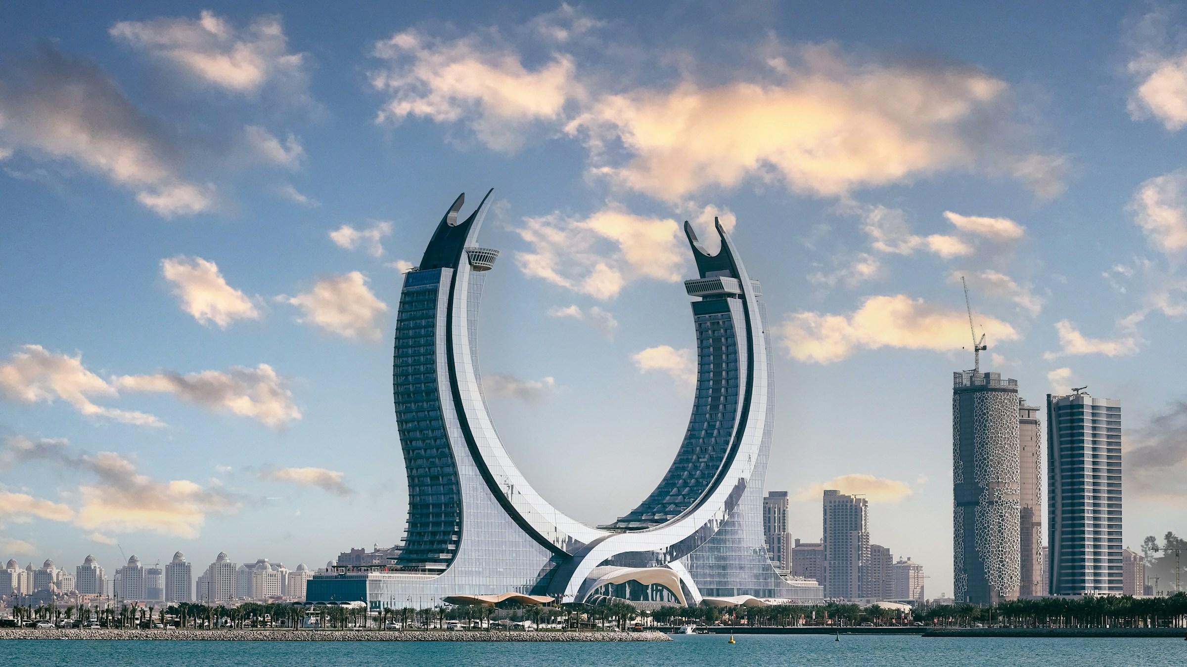 The crescent-shaped Katara Towers on the Lusail waterfront in Qatar