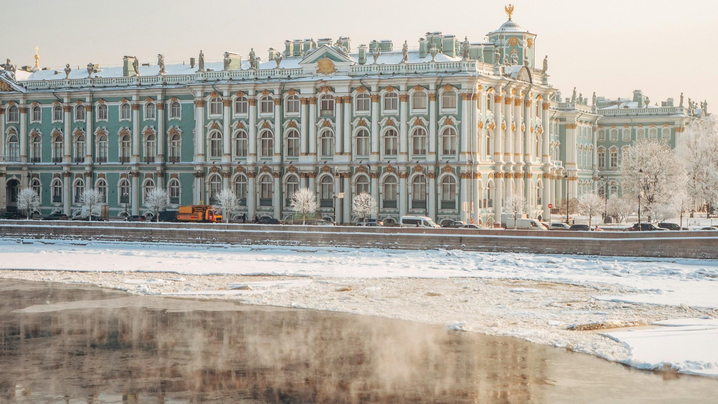 The Winter Palace beyond the frozen Neva in St Petersburg