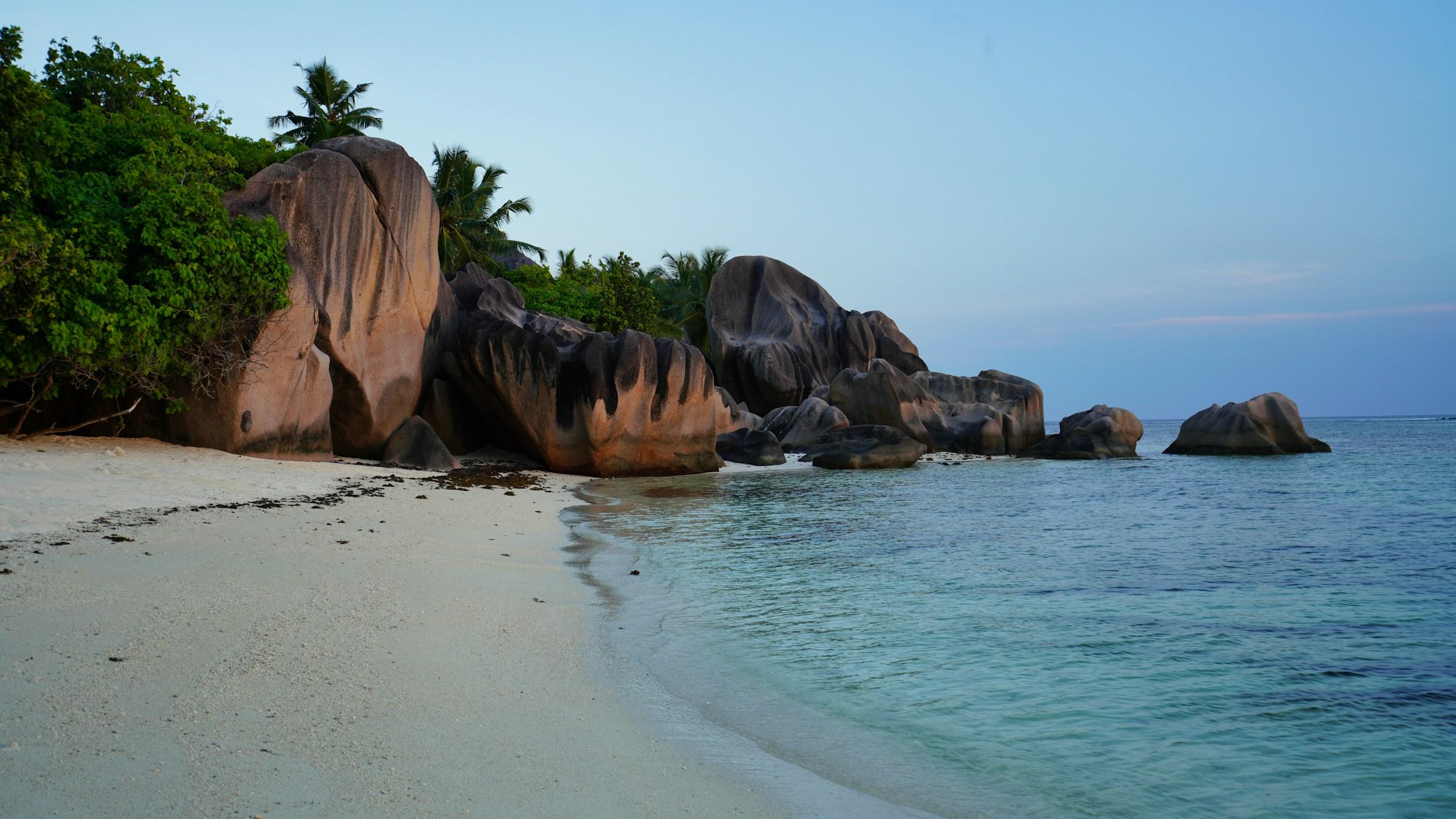 Granite boulders and turquoise water at Anse Source d'Argent beach on La Digue, Seychelles