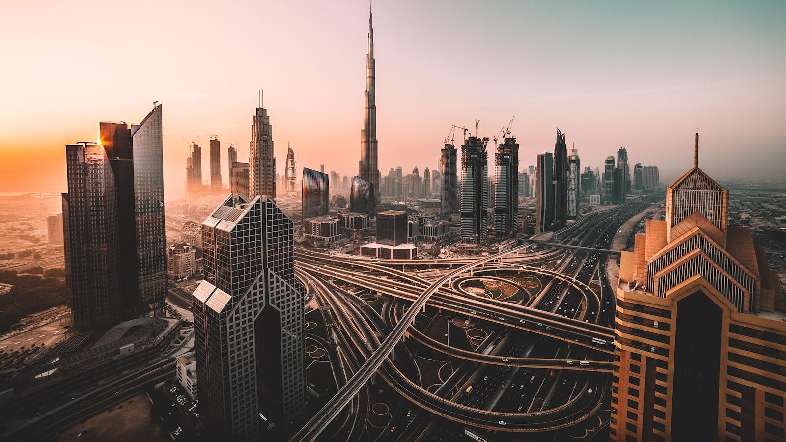 Downtown Dubai and the Burj Khalifa above the Sheikh Zayed Road interchange at dusk