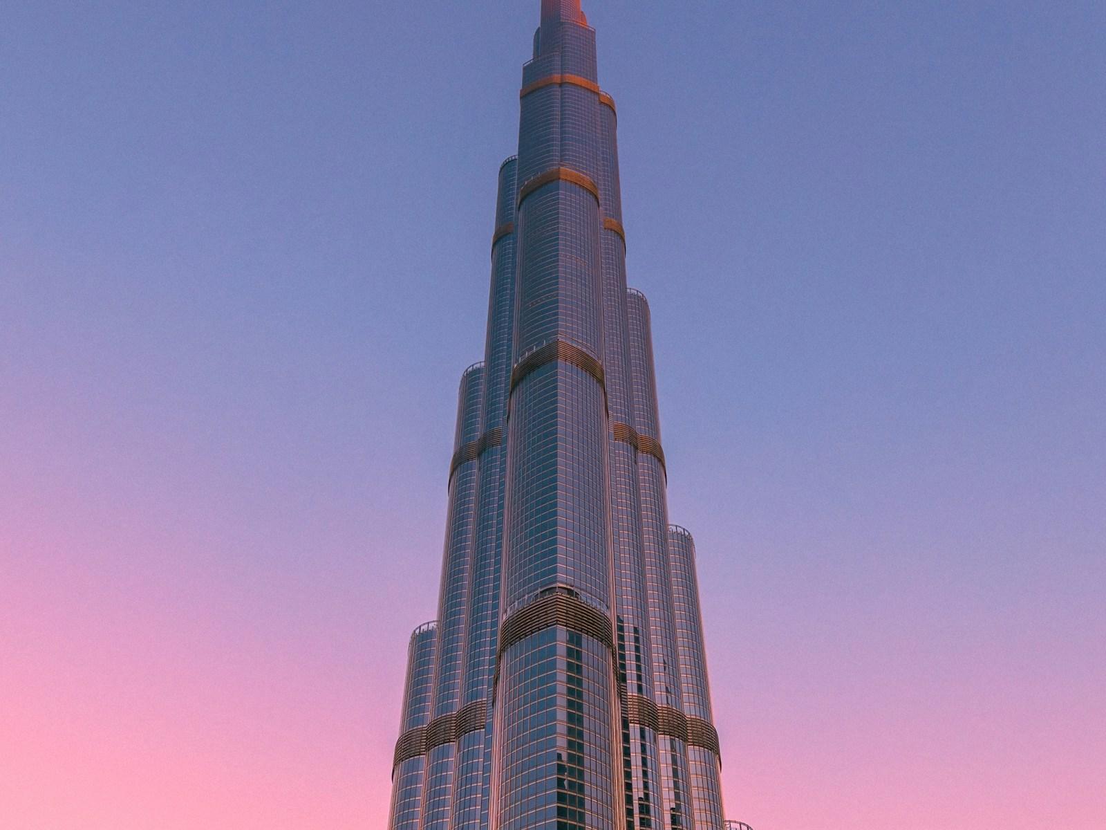 The Burj Khalifa against a pink sunset sky