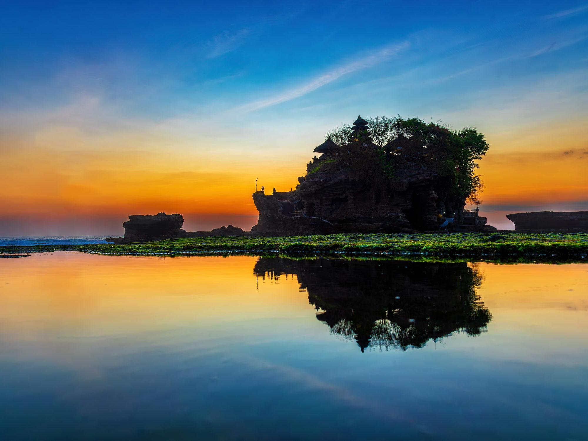 Tanah Lot Temple on its sea rock at sunset, Bali
