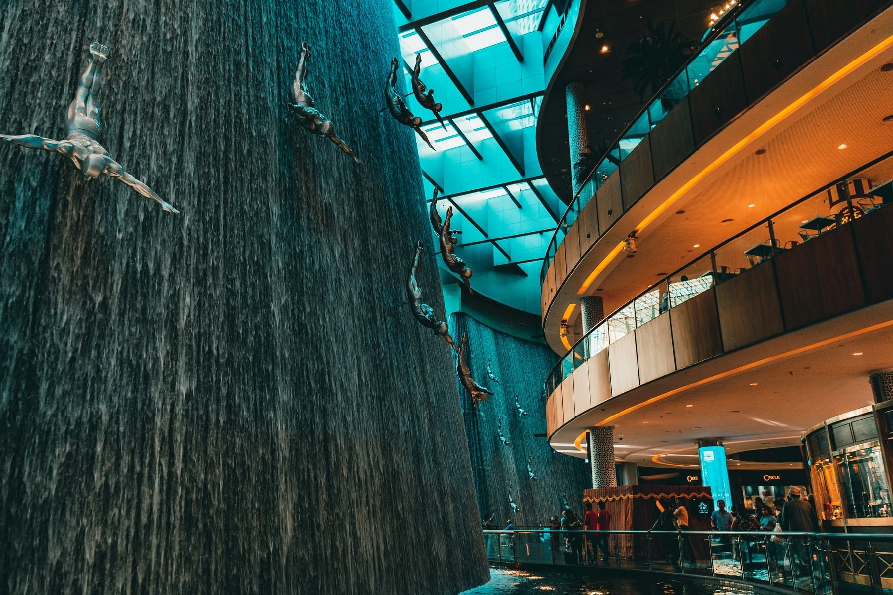 The waterfall and its divers sculpture in The Dubai Mall