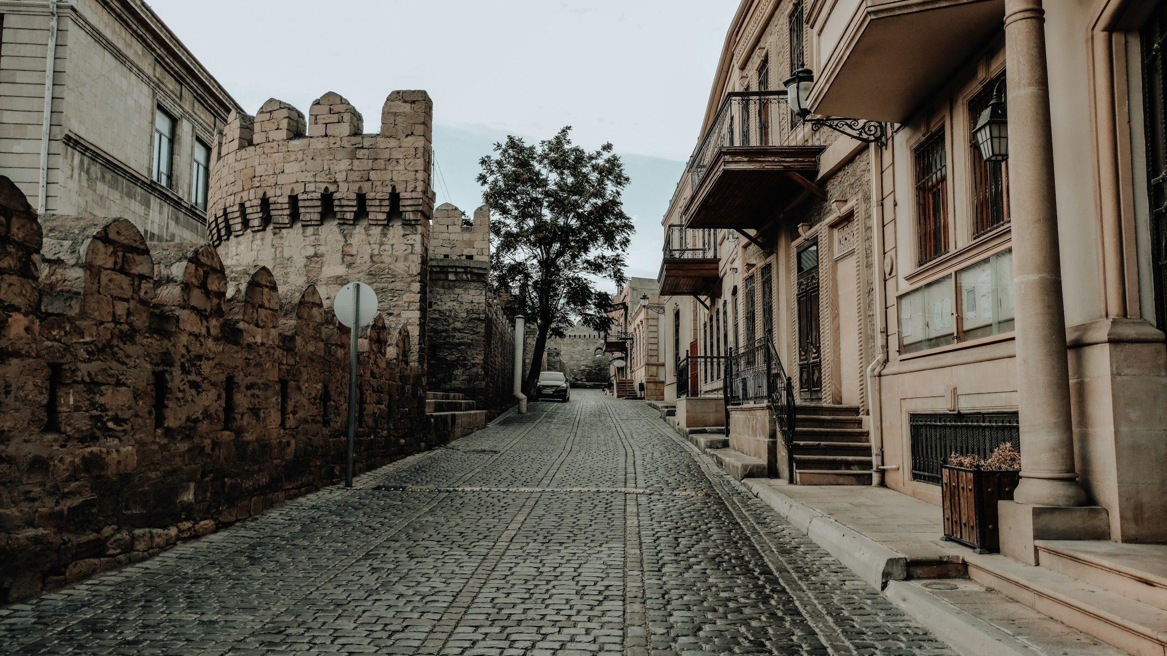 A cobbled street inside the walls of Icherisheher, Baku's Old City, Azerbaijan