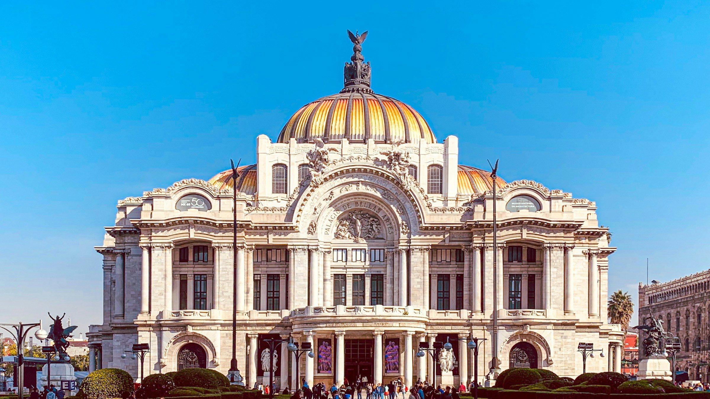 The Palacio de Bellas Artes in Mexico City under a blue sky