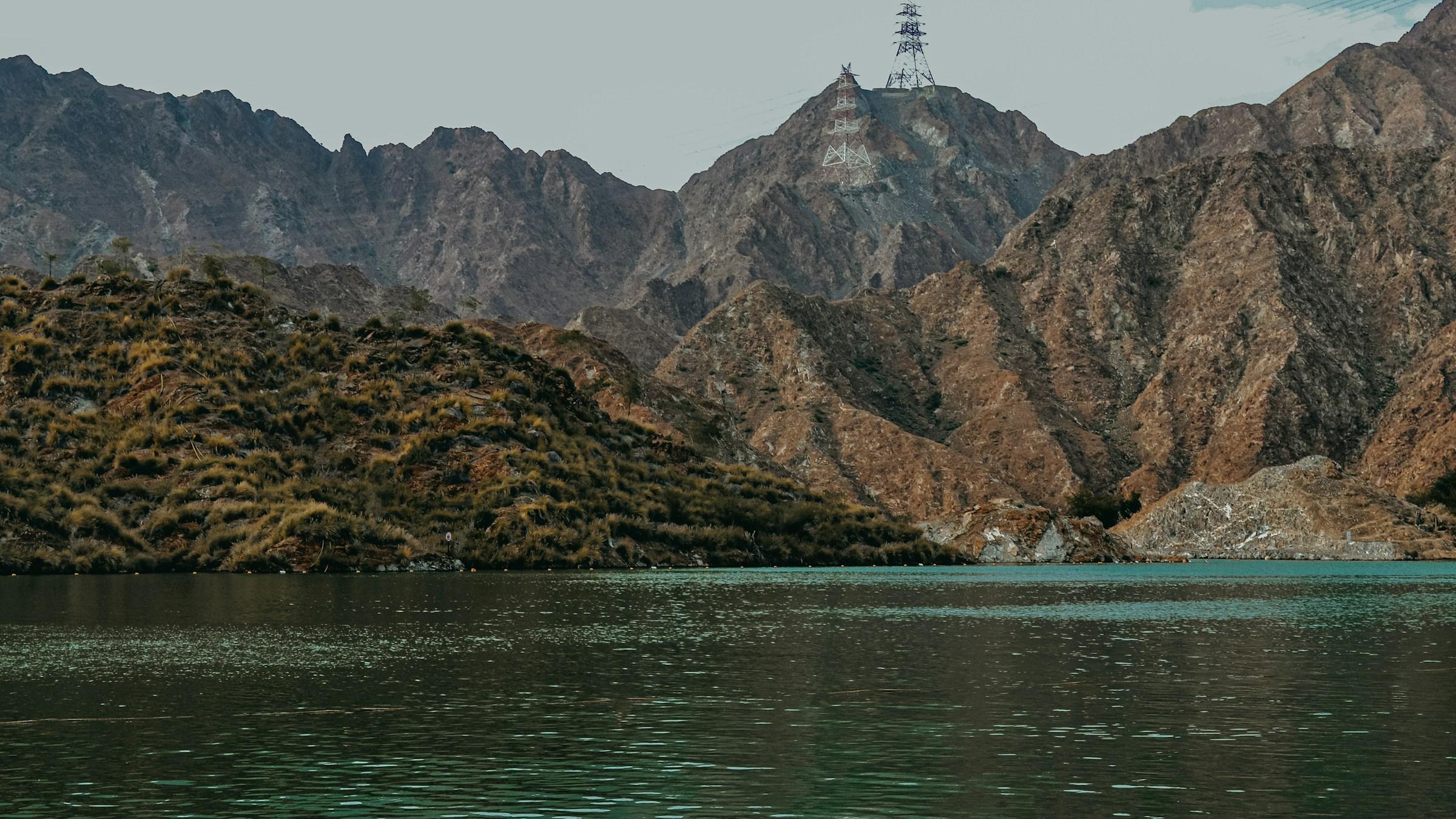 The lake at Al Rafisah Dam below the Hajar Mountains near Khorfakkan