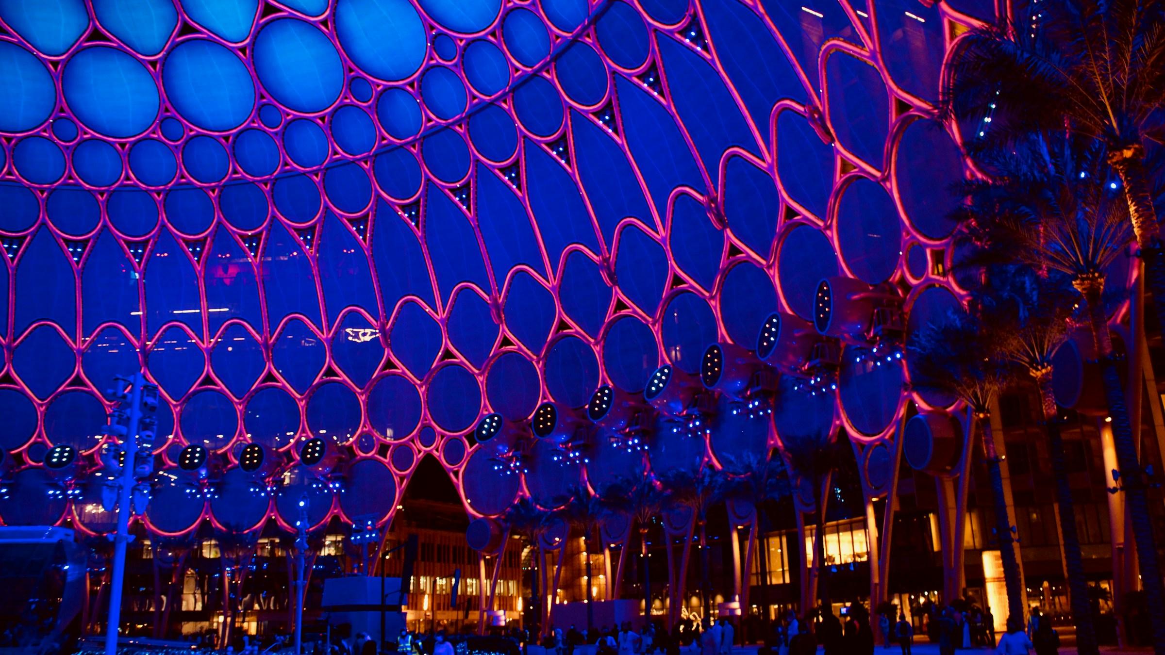 The lit dome of Al Wasl Plaza at Expo City Dubai at night