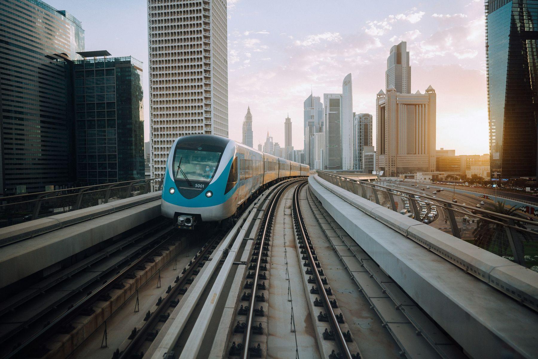 A Dubai Metro Red Line train beside Sheikh Zayed Road