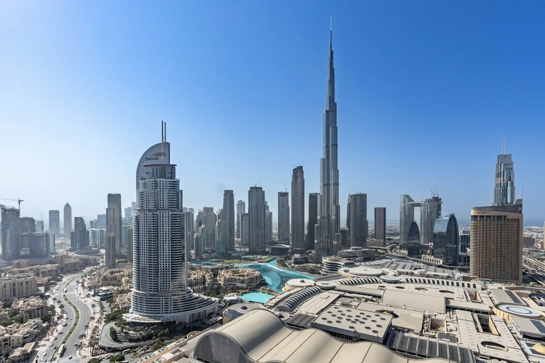 Downtown Dubai by day, with the Burj Khalifa rising above Burj Lake and The Dubai Mall