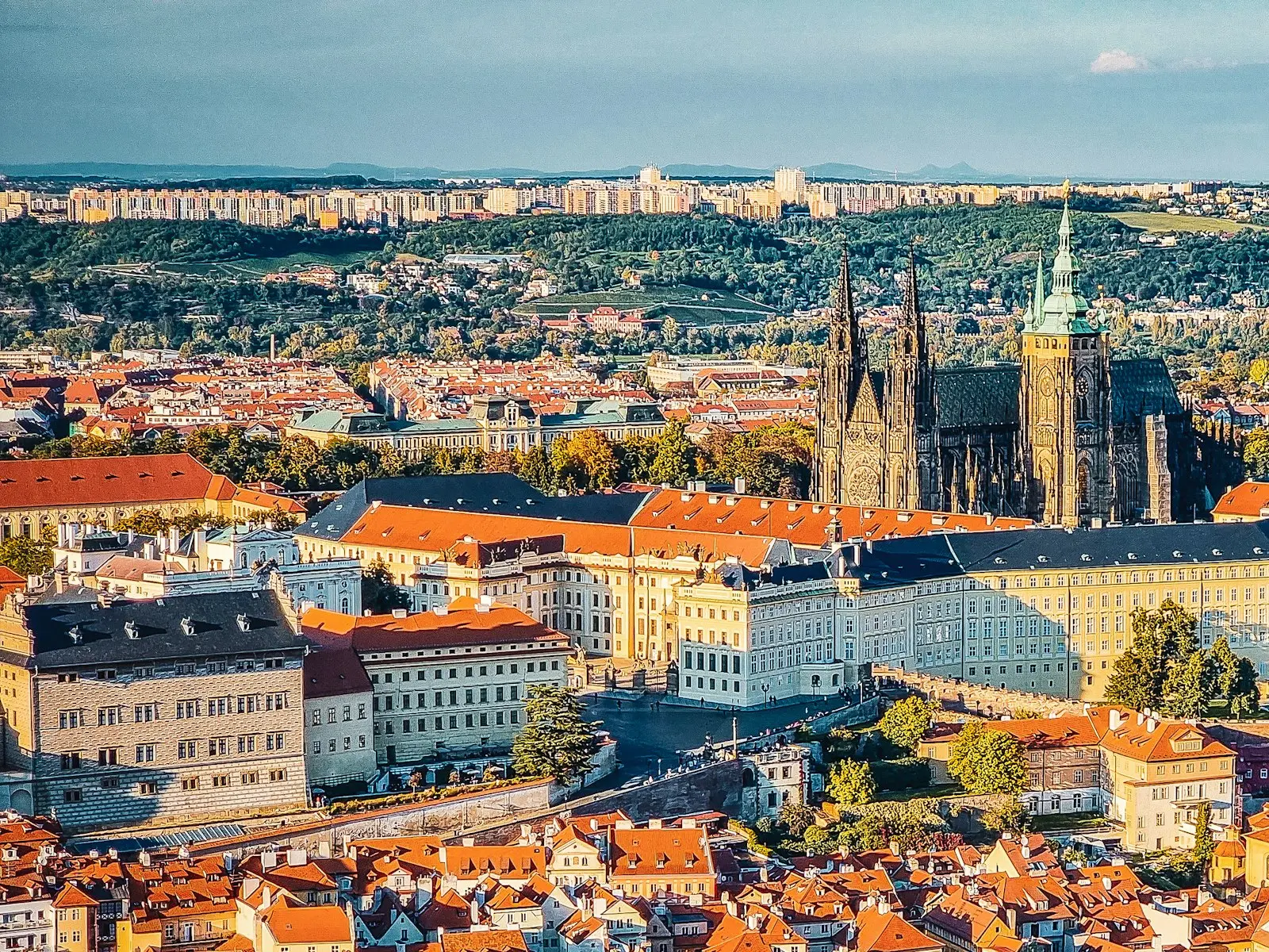 Prague Castle and St Vitus Cathedral above the red rooftops of the Lesser Town, Prague