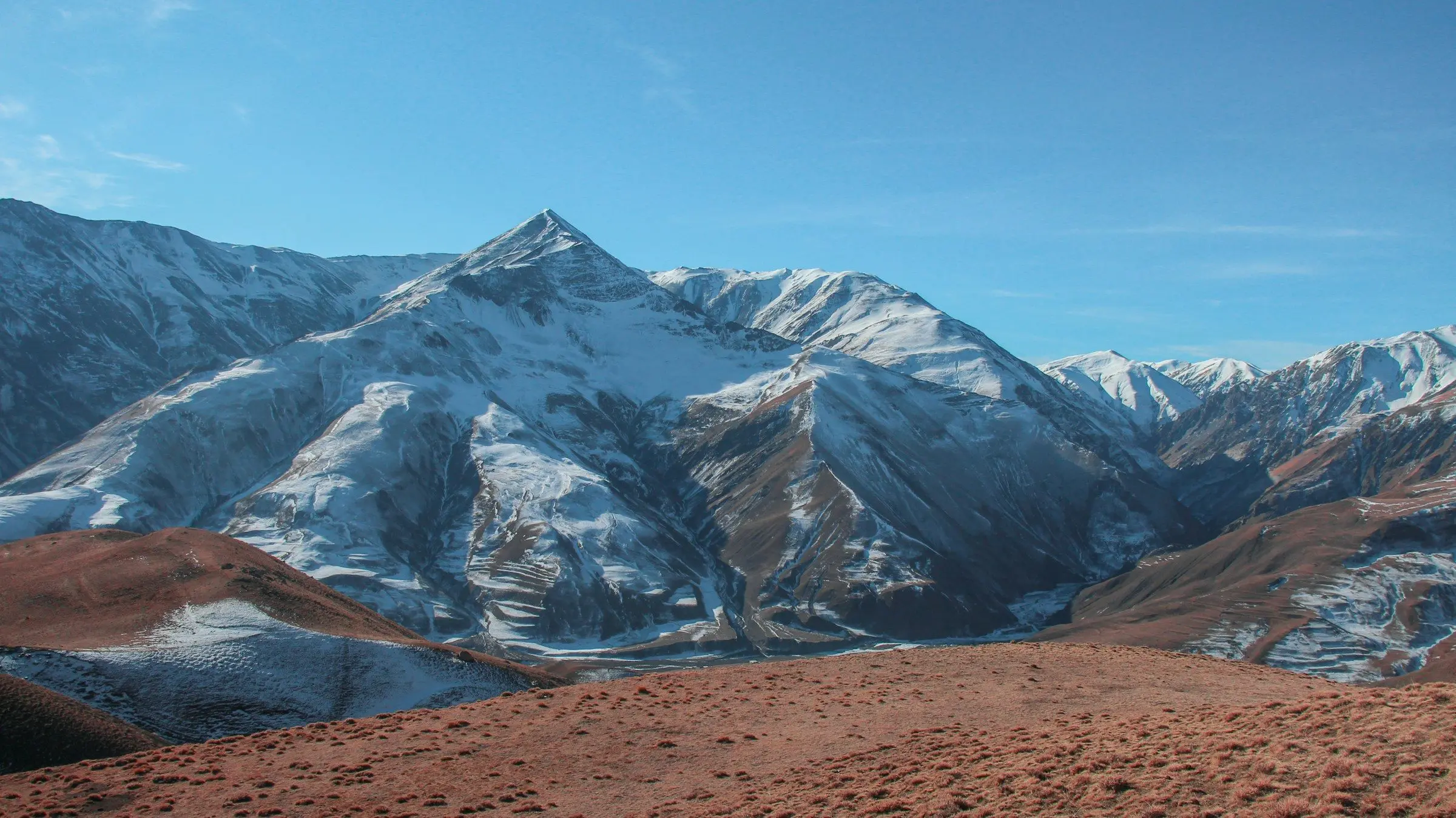 Snow-streaked Caucasus peaks seen from Khinaliq in northern Azerbaijan