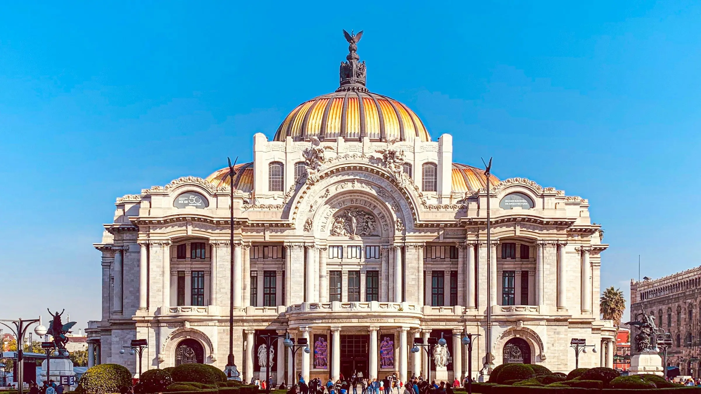 The Palacio de Bellas Artes in Mexico City under a blue sky