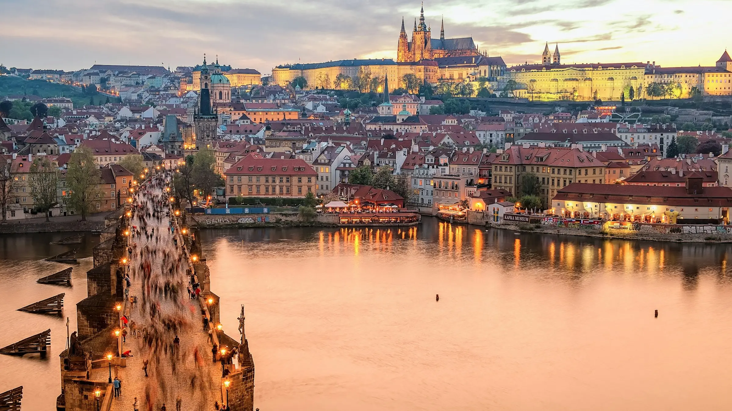 Charles Bridge and Prague Castle over the Vltava at golden hour