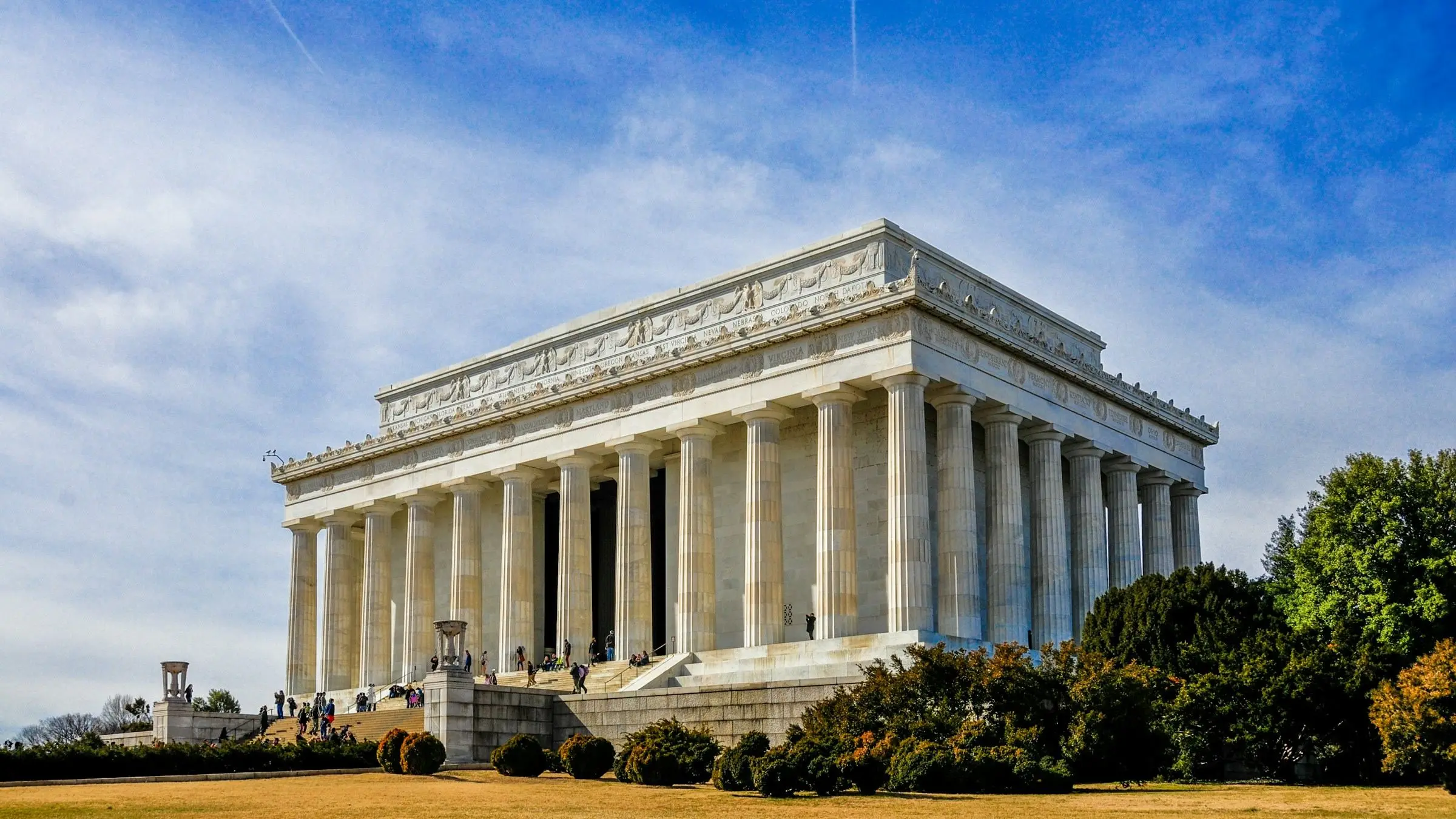 The Lincoln Memorial in Washington, D.C., under a blue sky