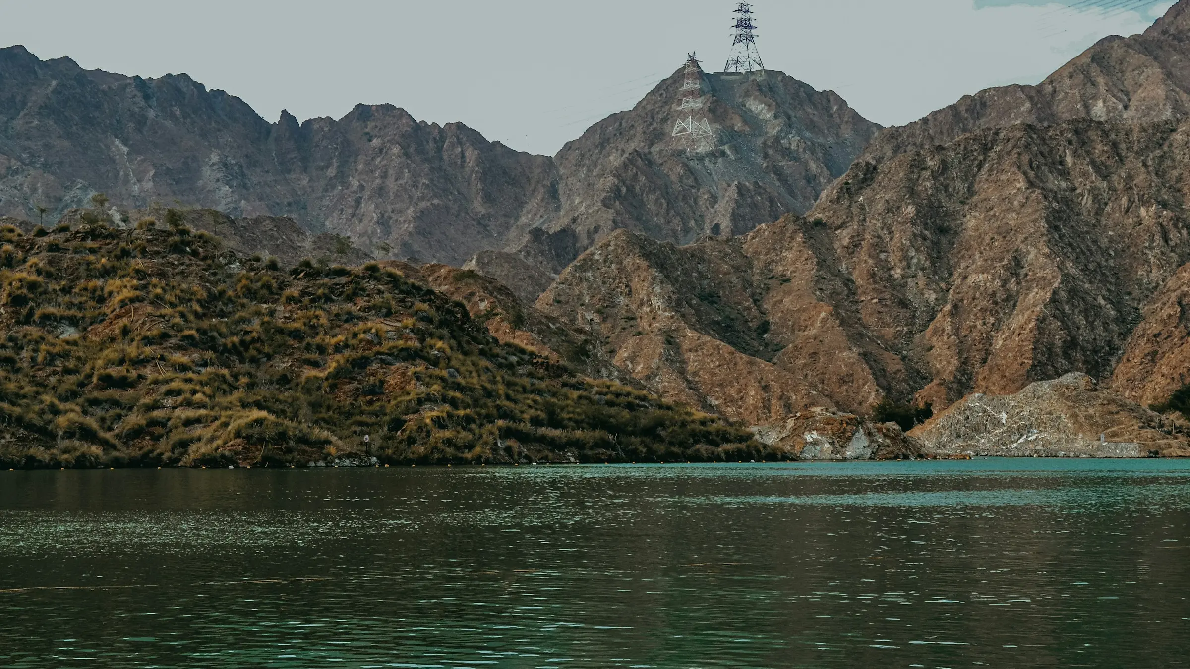 The lake at Al Rafisah Dam below the Hajar Mountains near Khorfakkan