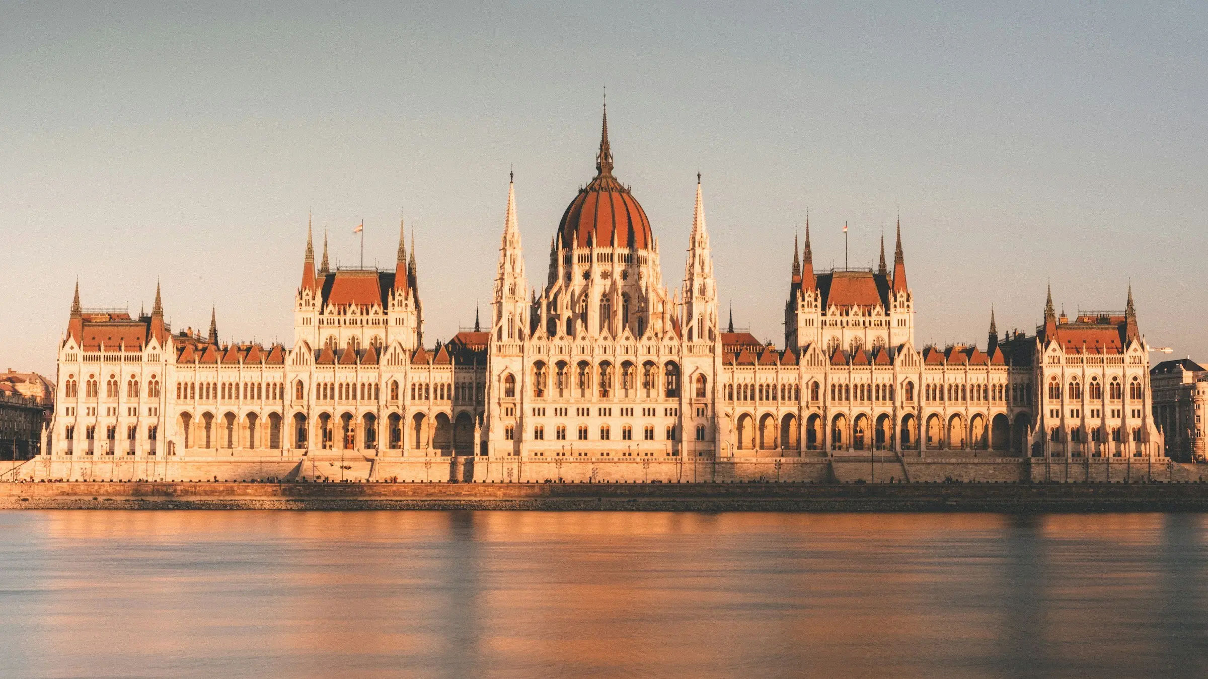 The Hungarian Parliament on the Danube at sunset