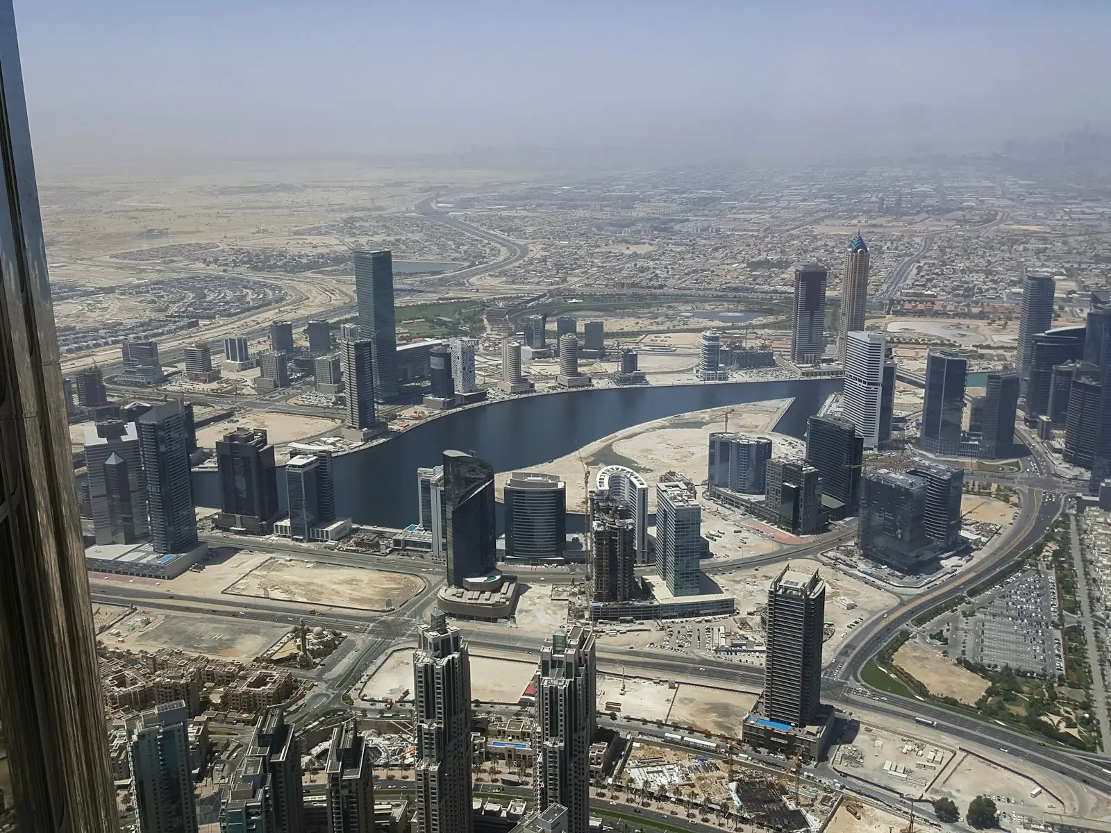 Downtown Dubai's towers seen from high up the Burj Khalifa