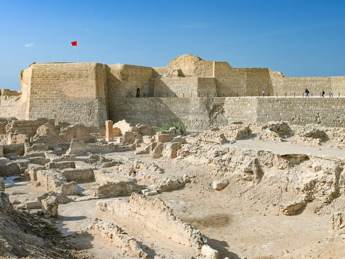 The walls of Qal'at al-Bahrain above its excavated ancient city