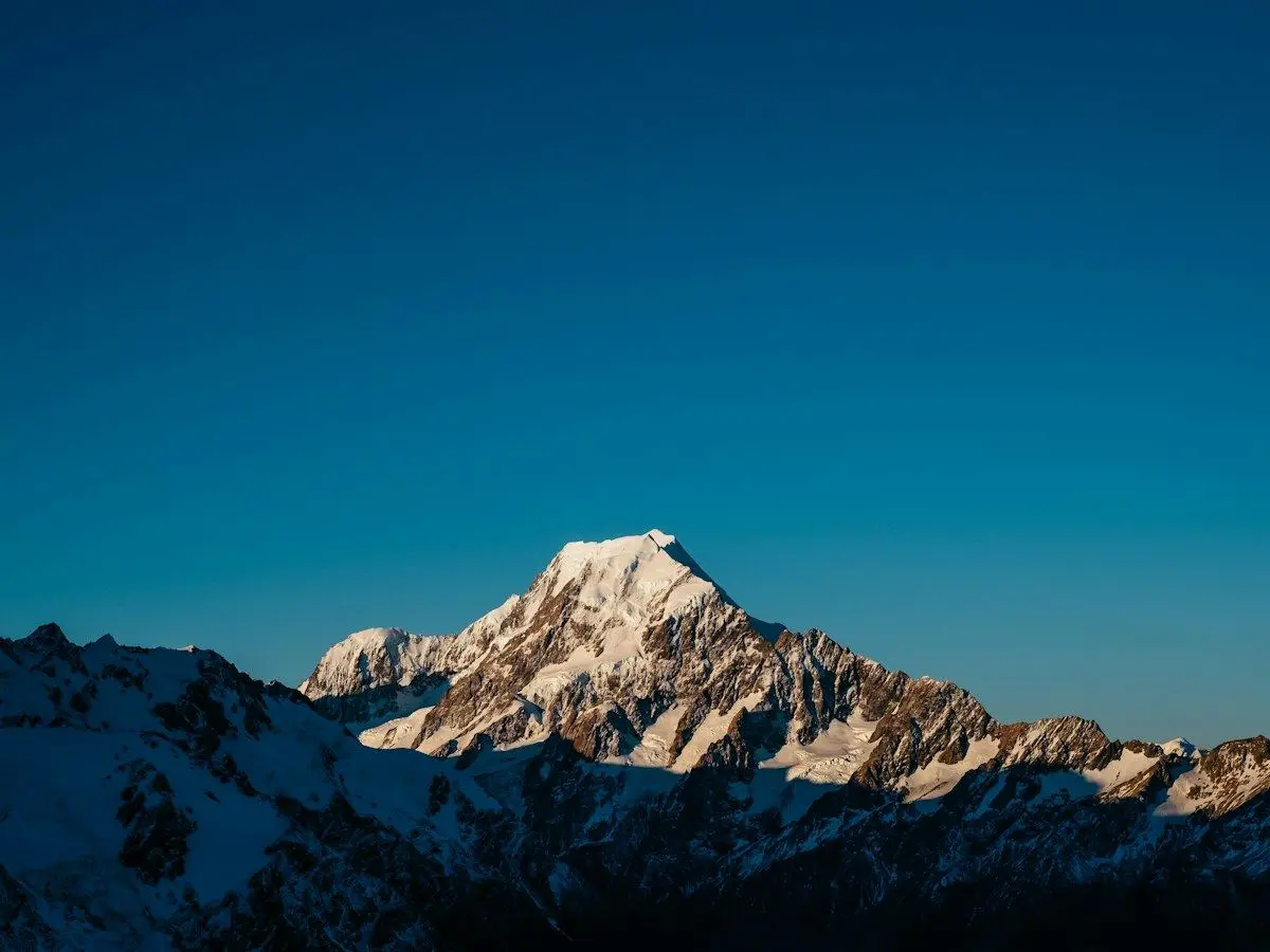 The snow-covered peak of Aoraki / Mount Cook at sunrise