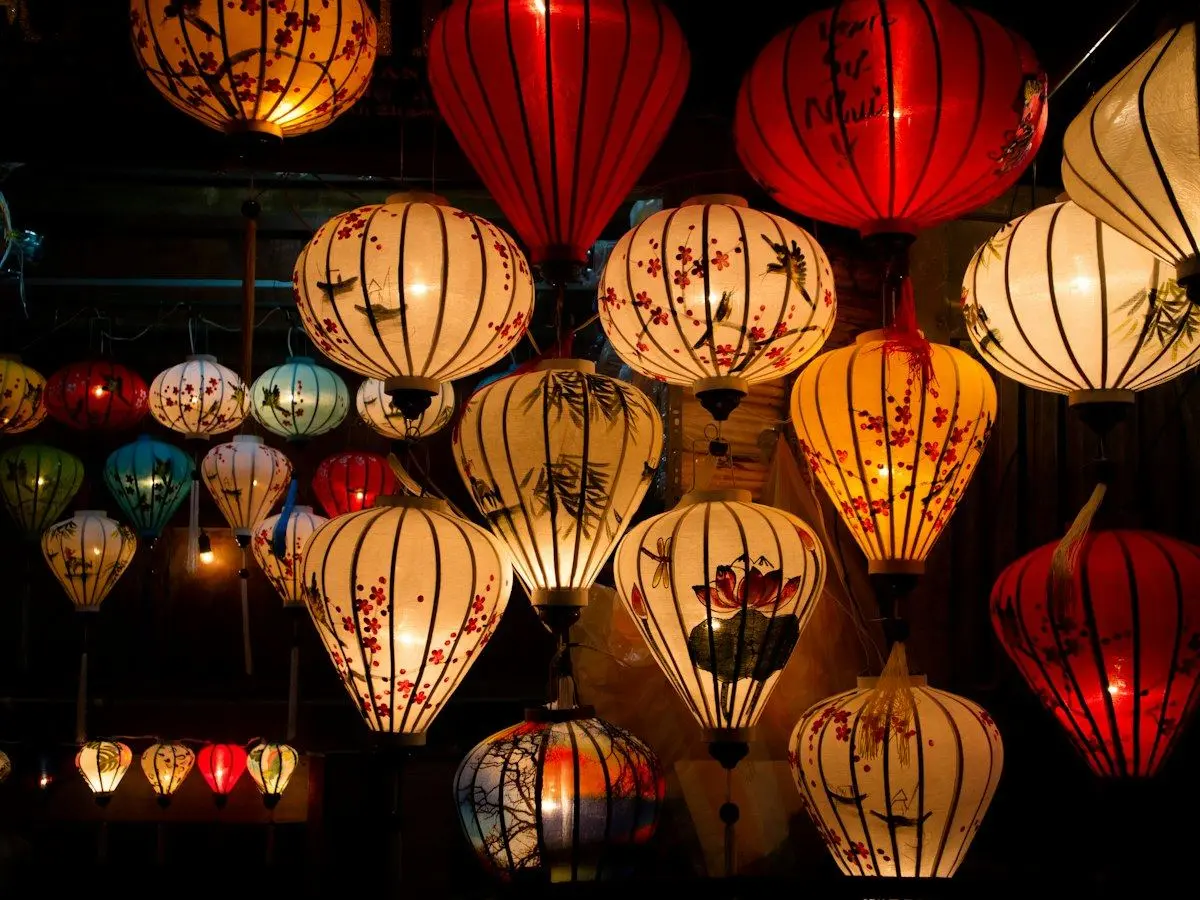 Silk lanterns glowing in the old town of Hoi An