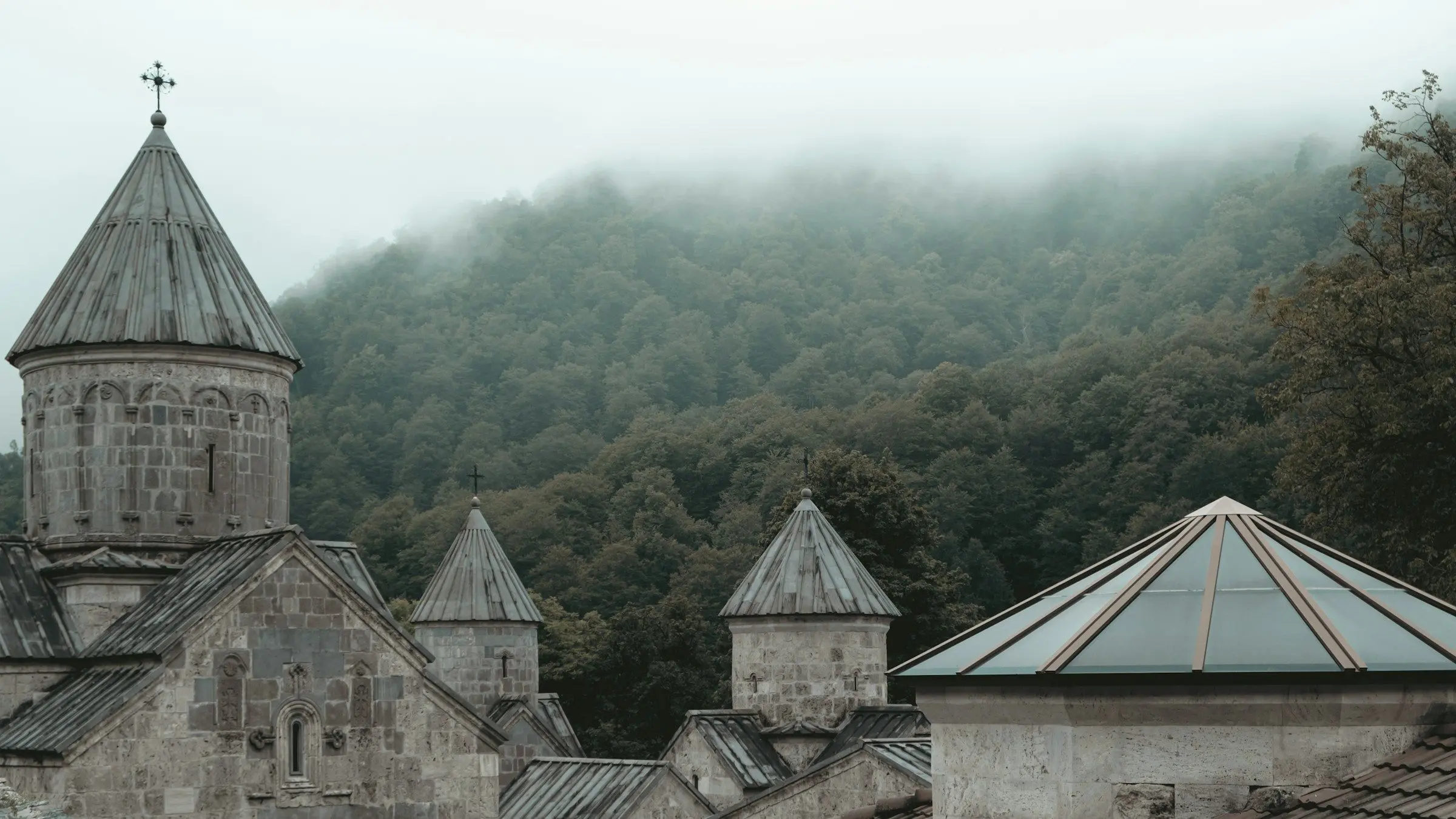 A medieval stone monastery in the forested hills around Dilijan, Armenia